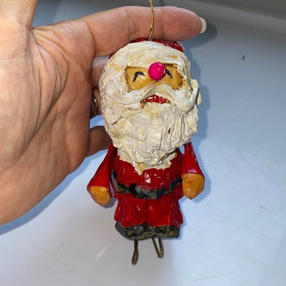 Vintage paper mache Santa Claus on skates Christmas tree ornament